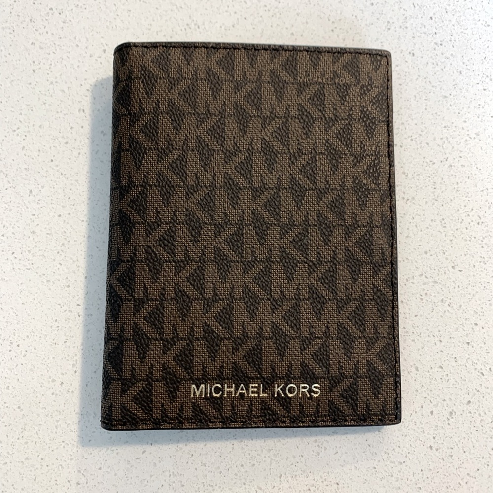 Brand new, never used Michael Kors passport wallet